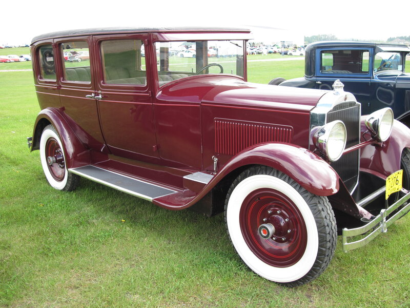 Maroon Vintage Car — Calm, Afternoon, Photograph, Grass Field