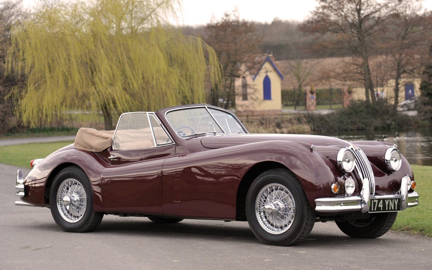 Maroon vintage convertible car
