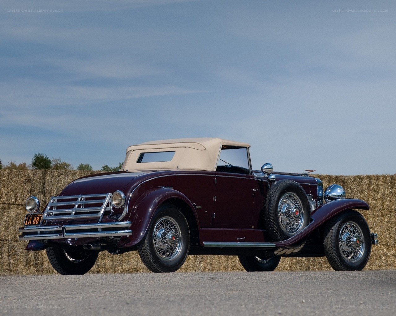 Maroon vintage convertible car