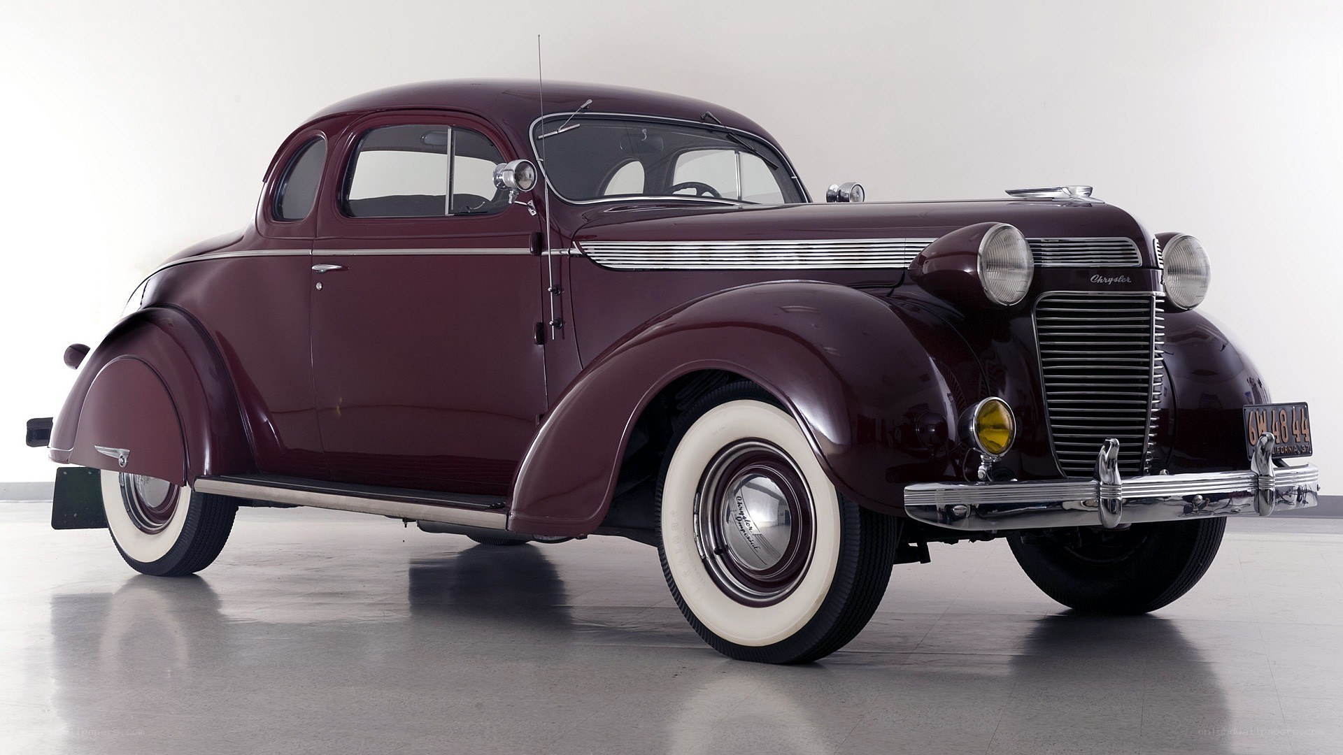Maroon vintage coupe car