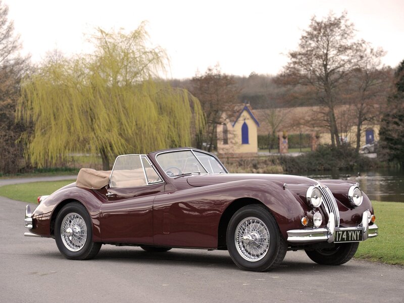 Maroon vintage Jaguar convertible