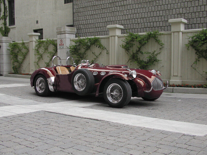 Maroon vintage roadster car