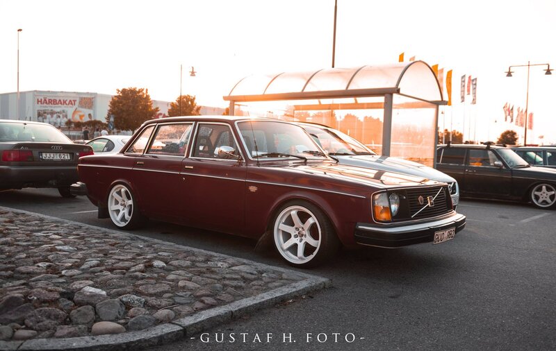 Maroon Volvo Sedan