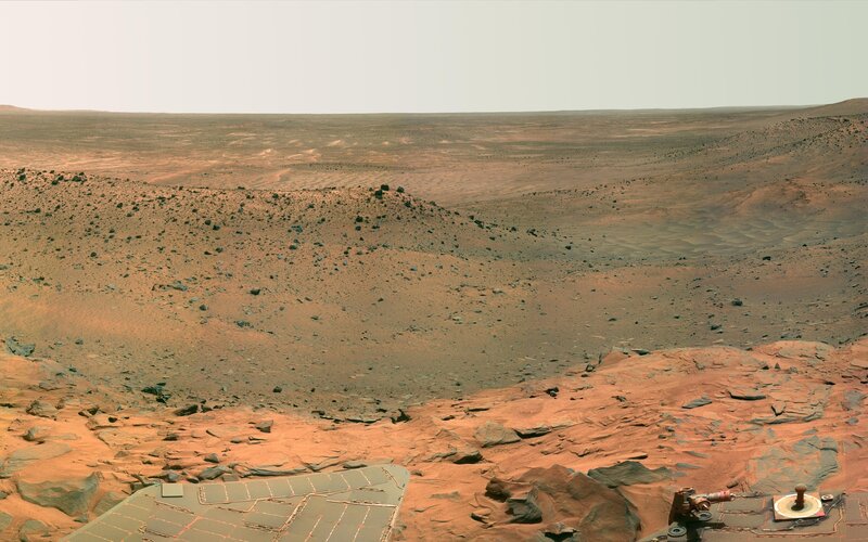 Mars rover on alien landscape