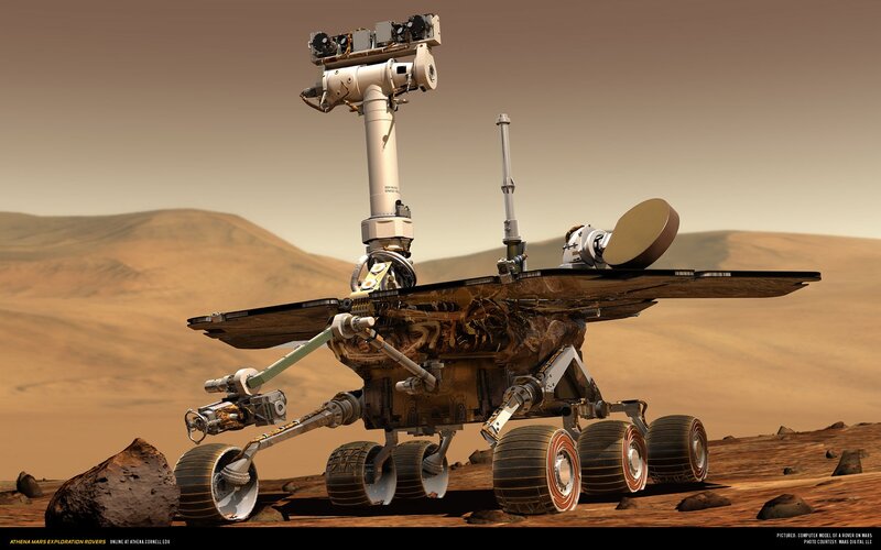 Mars rover on alien landscape