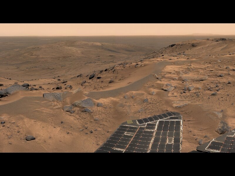 Mars Rover on Martian Surface — Brown, Desolate, Photograph, Solar Panels, Rocks