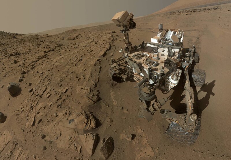 Mars Rover on Rocky Terrain — Brown