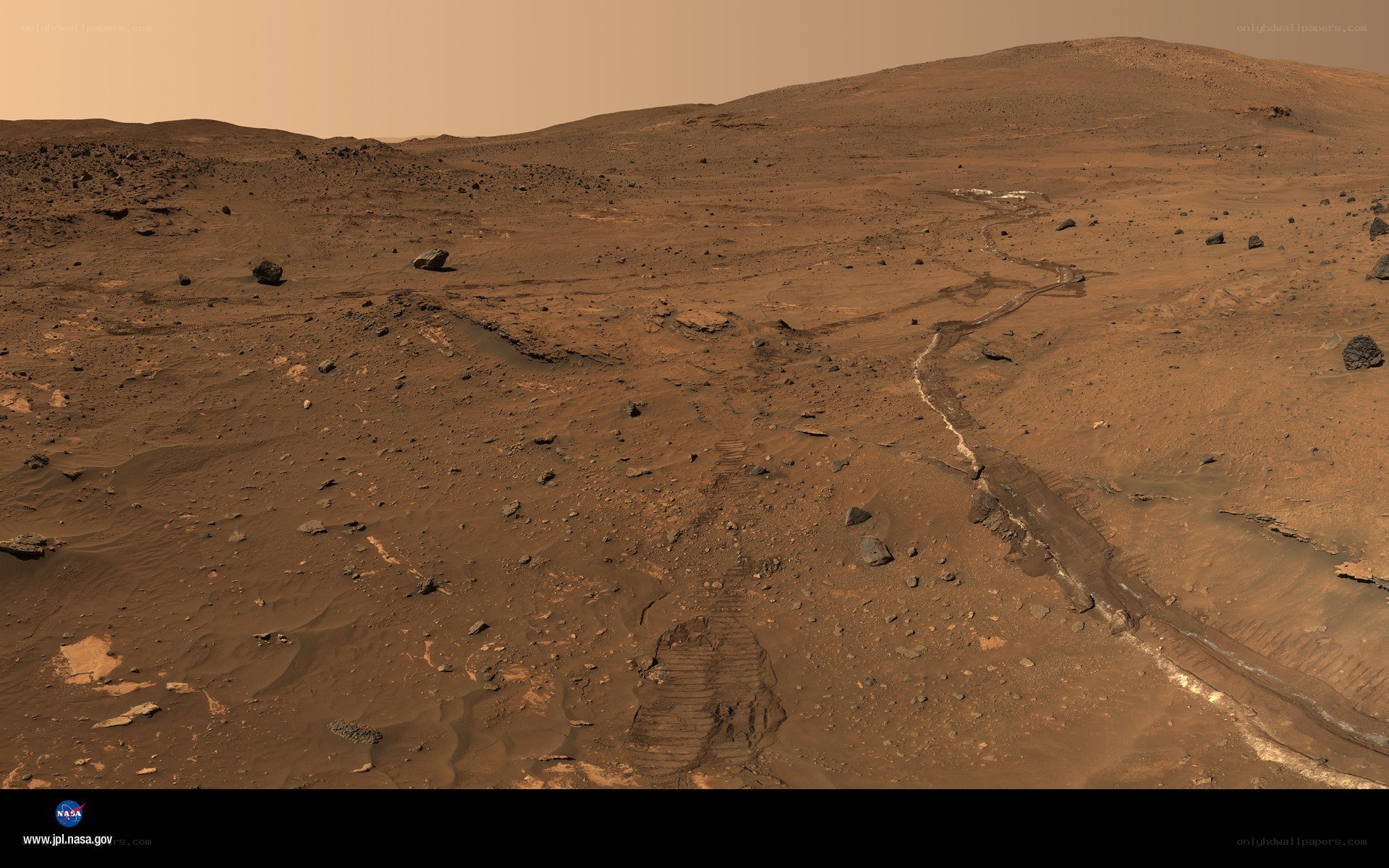 Mars rover tracks on red planet