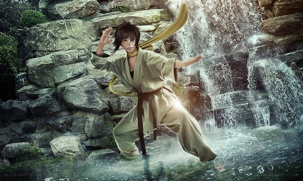 martial artist by waterfall