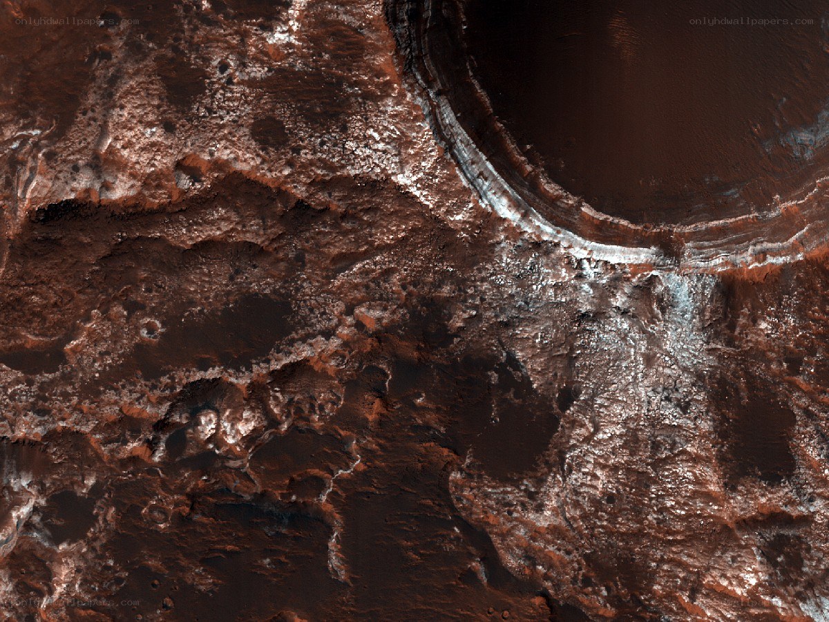 Martian surface with crater