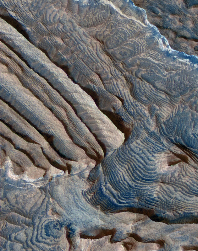 Martian surface with layered terrain