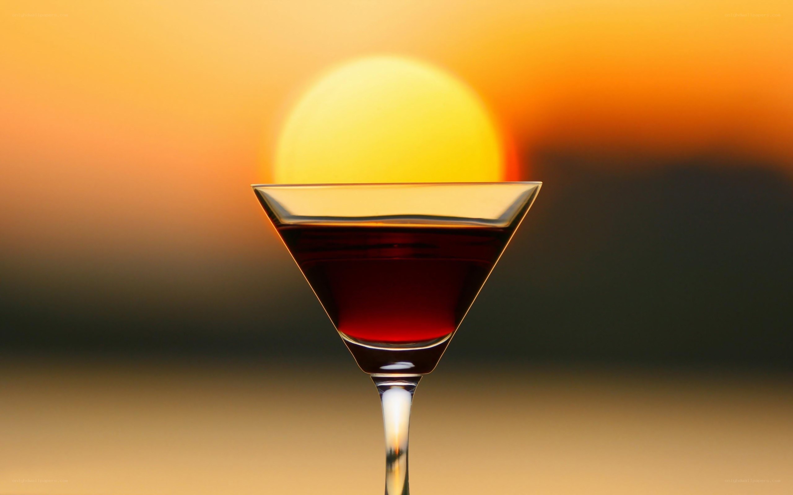 Martini glass at sunset