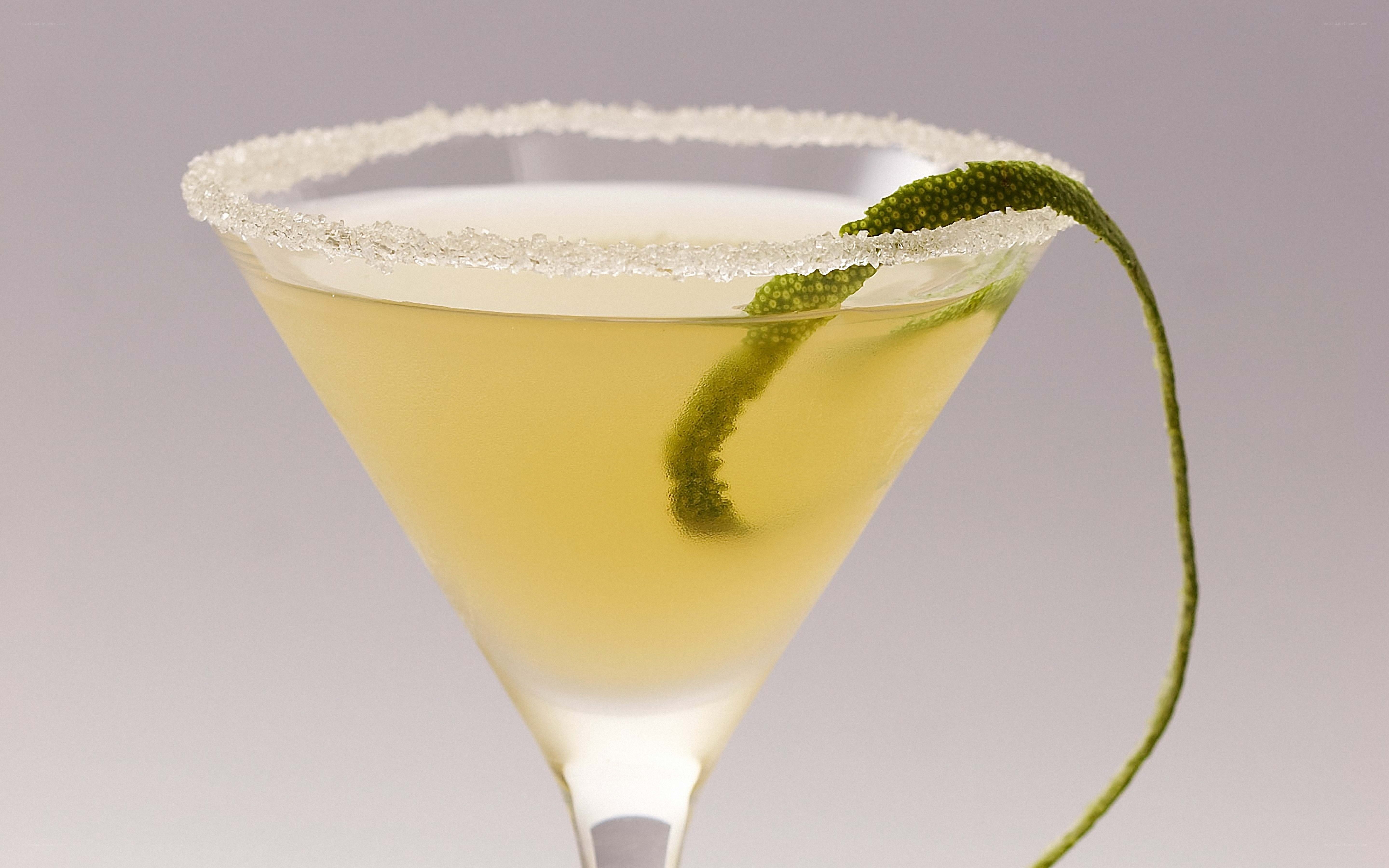 martini with lime garnish