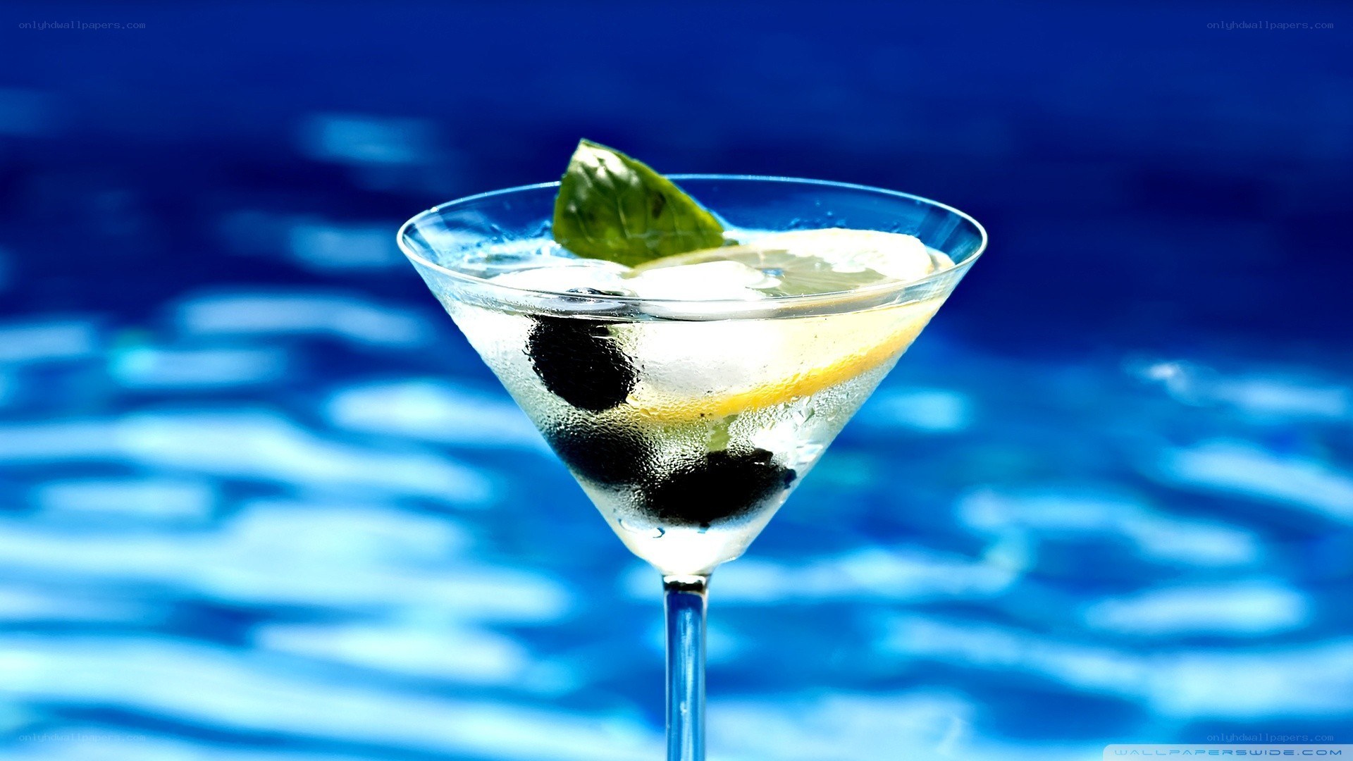Martini with olives and basil