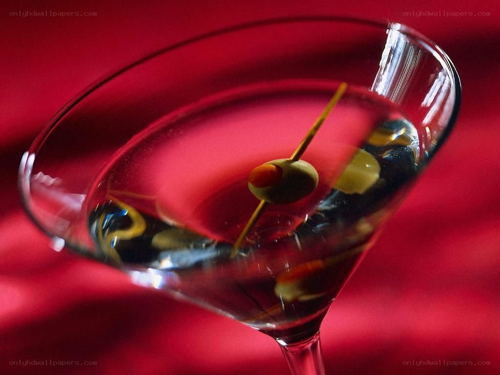 Martini with olives on red