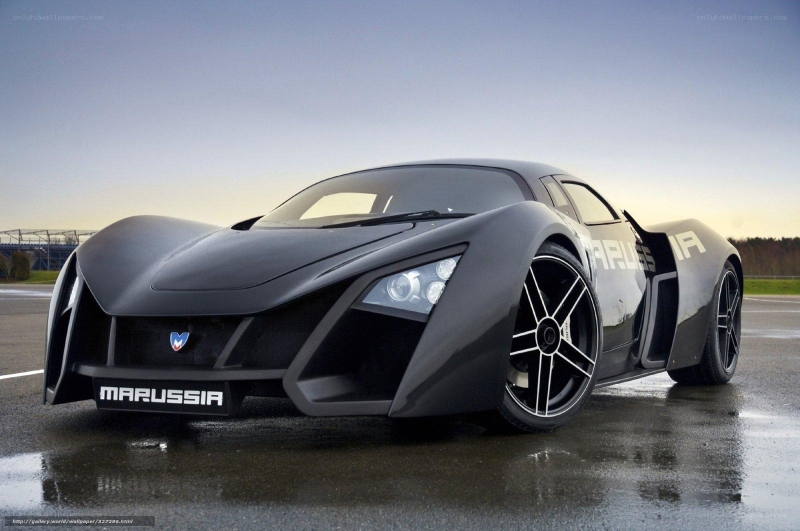 Marussia sports car on wet track