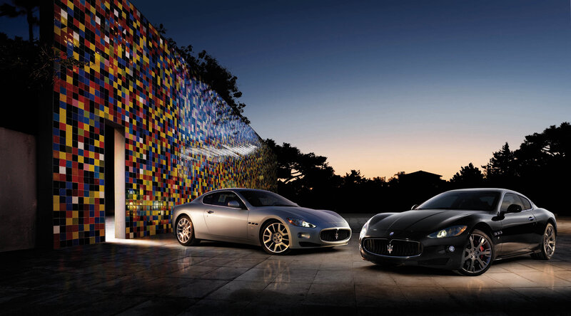 Maserati cars at dusk