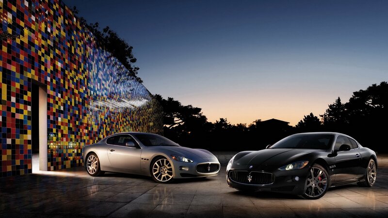 Maserati cars at dusk
