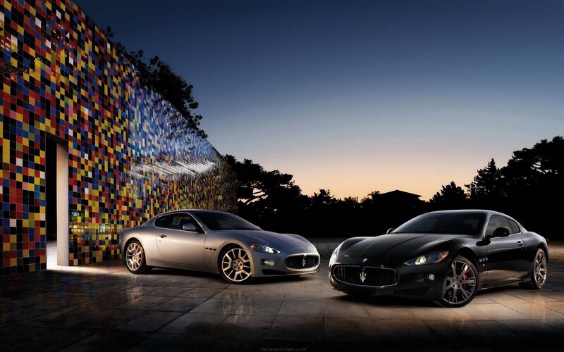 Maserati cars at dusk