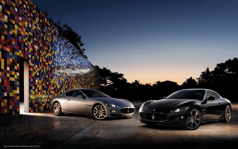 Maserati cars at dusk