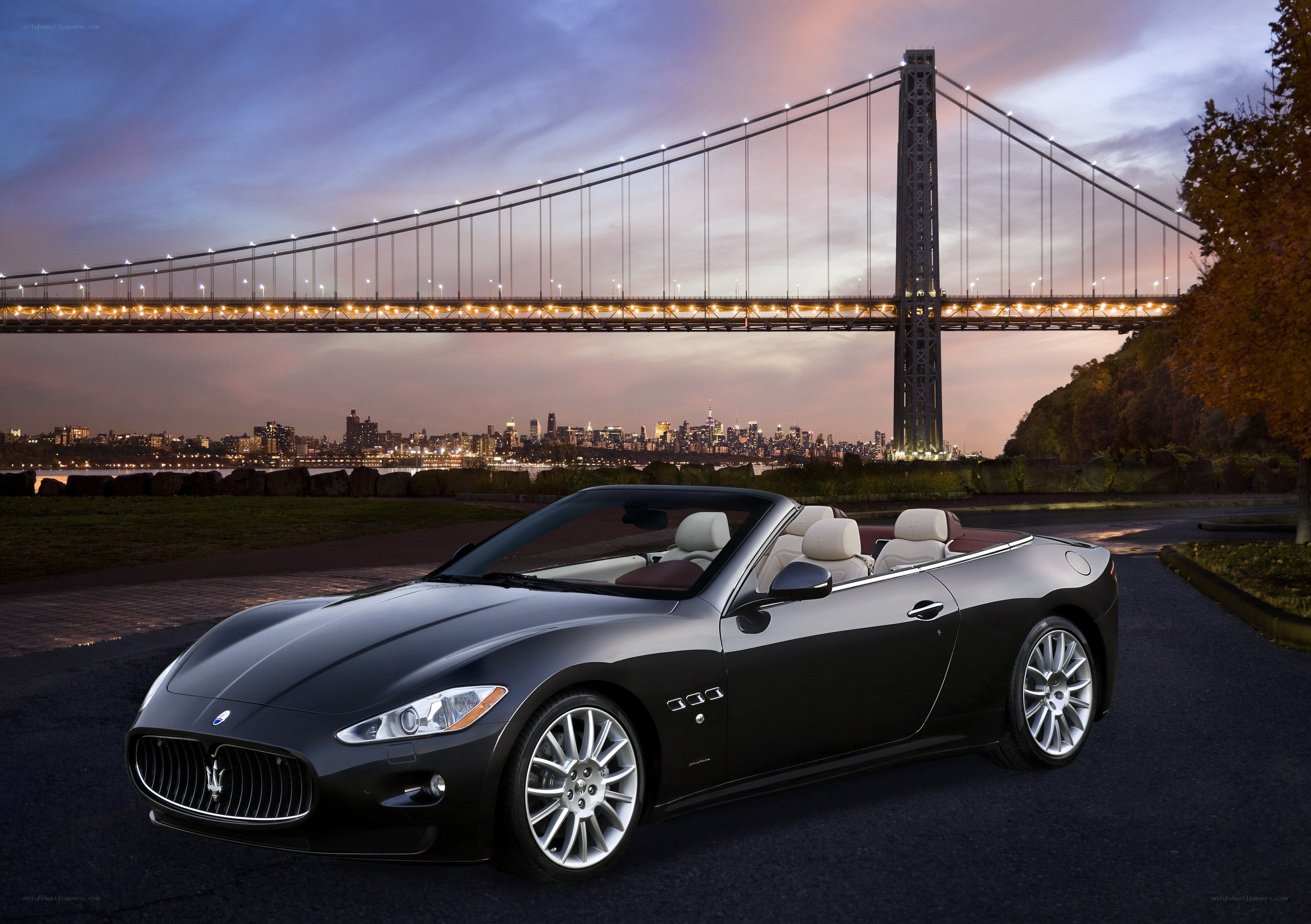 Maserati convertible by a bridge