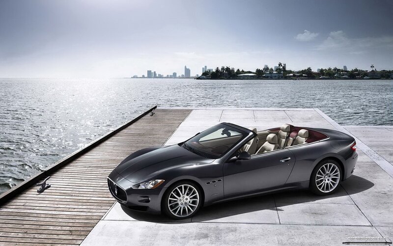 Maserati convertible on a dock