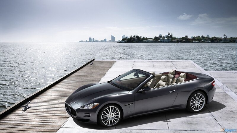 Maserati convertible on a dock