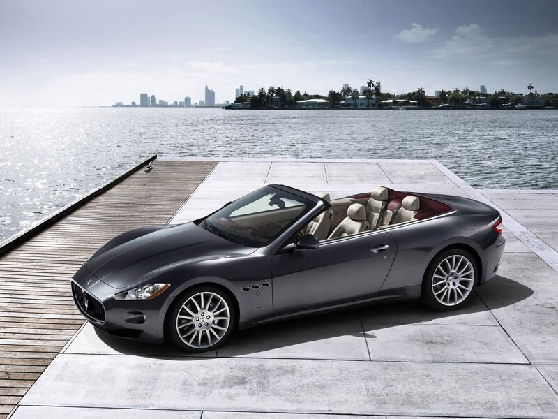 Maserati convertible on a dock