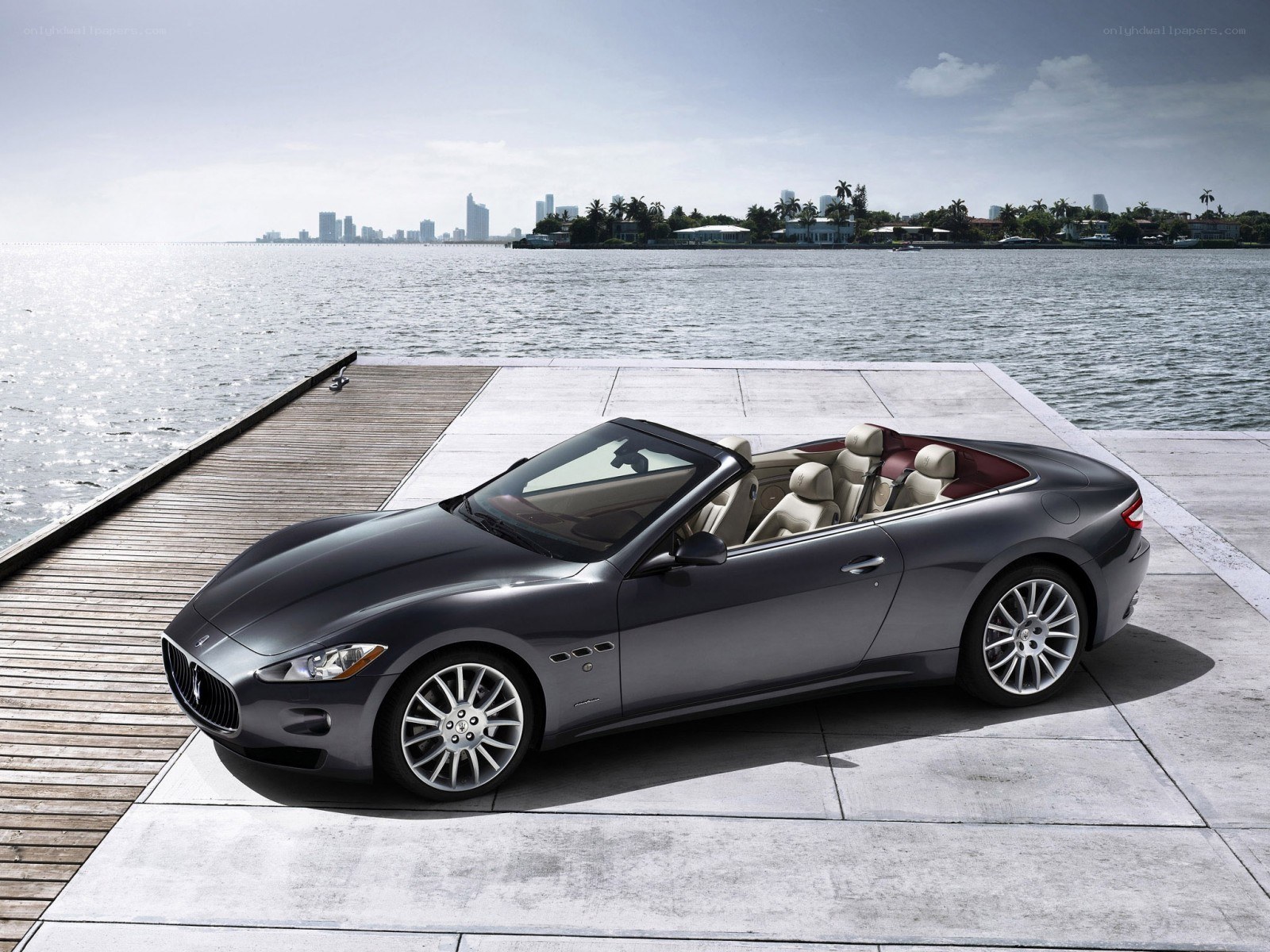 Maserati convertible on a dock