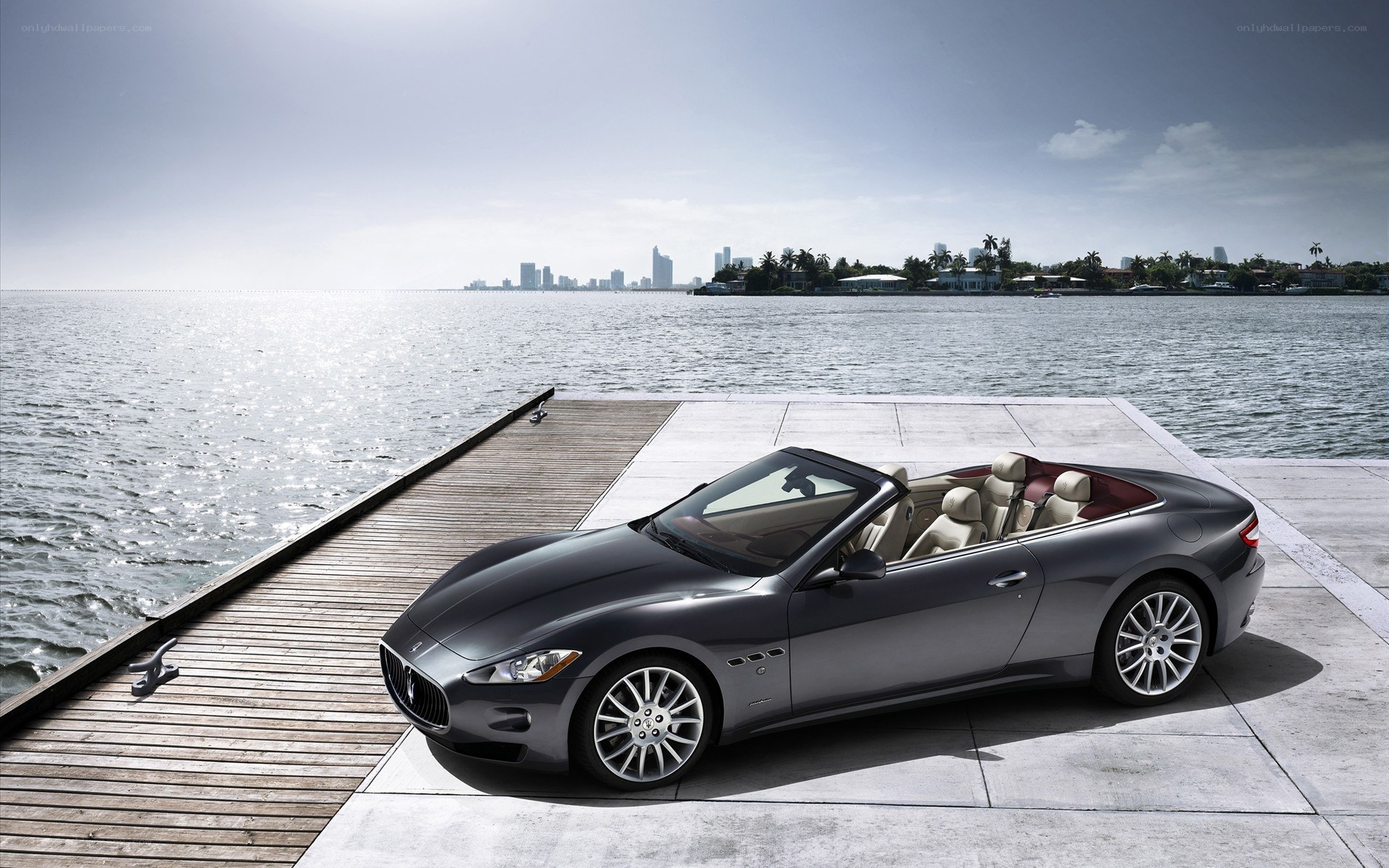 Maserati convertible on a dock