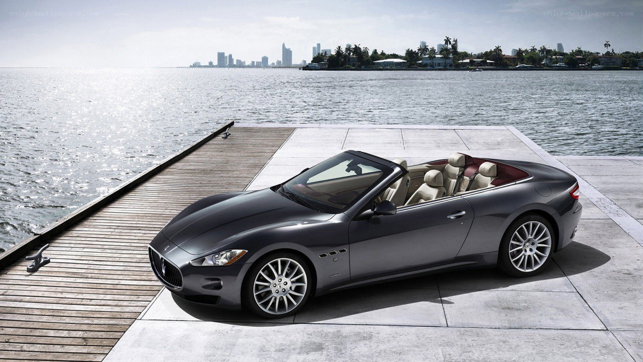 Maserati convertible on dock