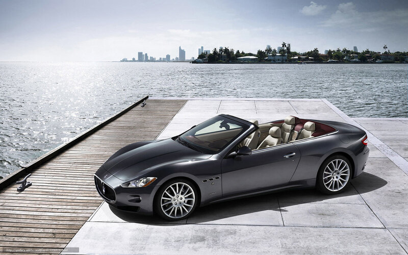 Maserati convertible on dock