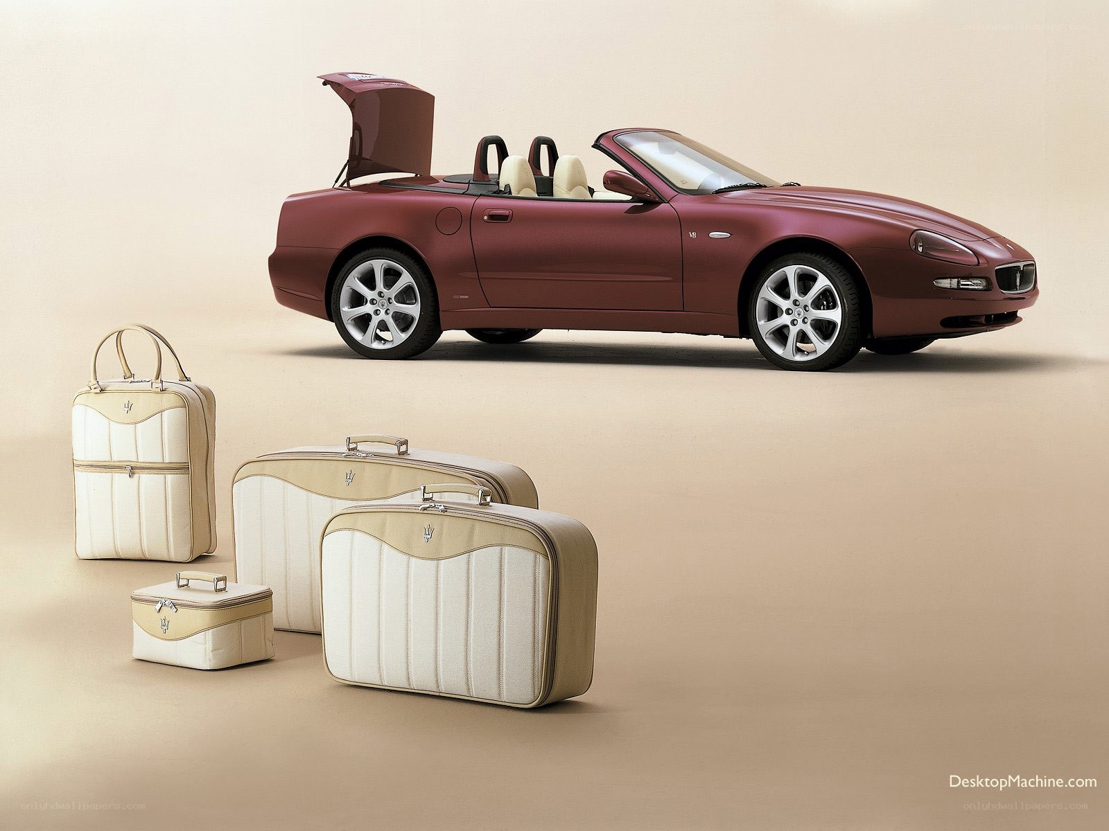 Maserati convertible with luggage