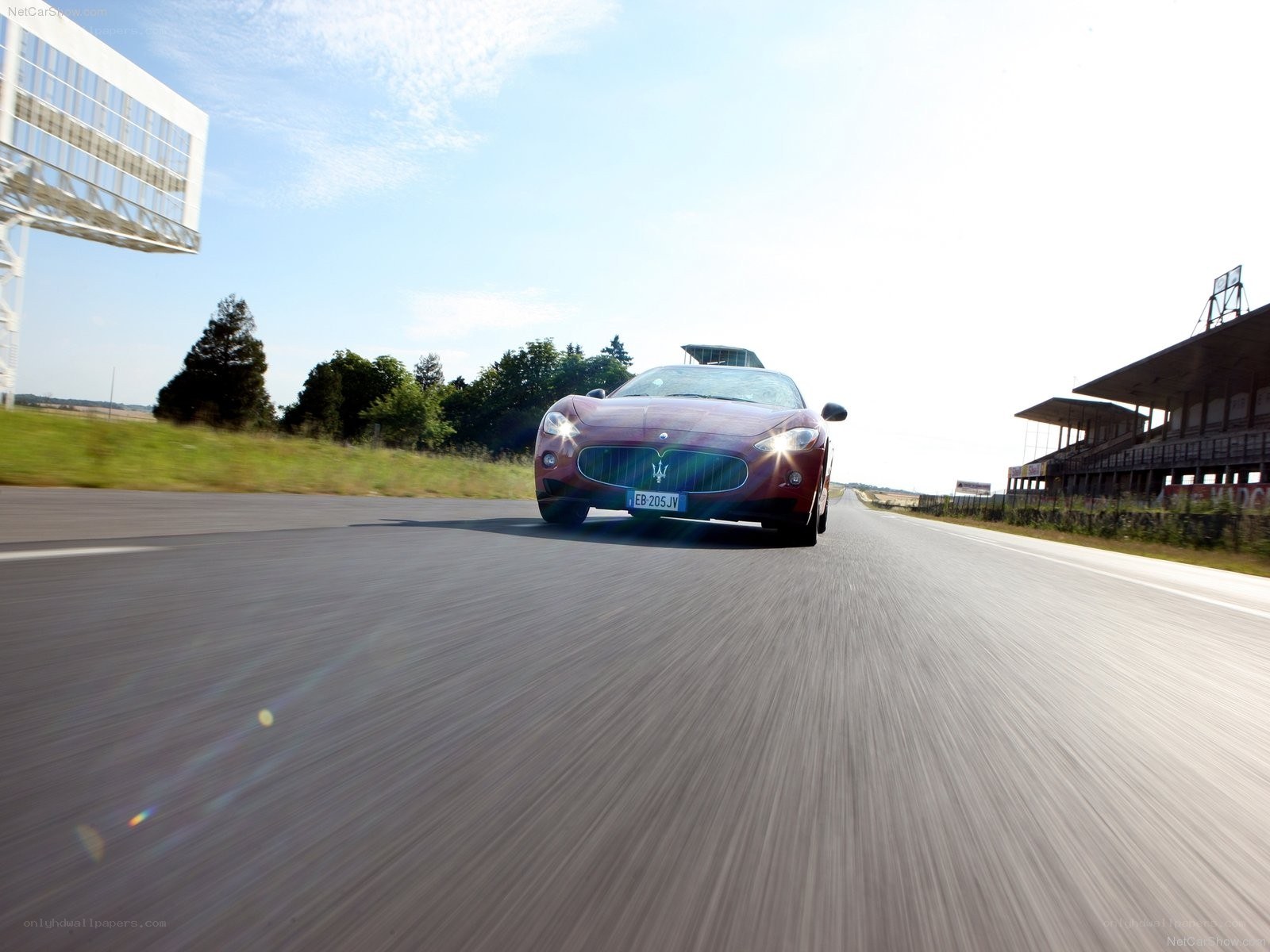 Maserati driving on a racetrack