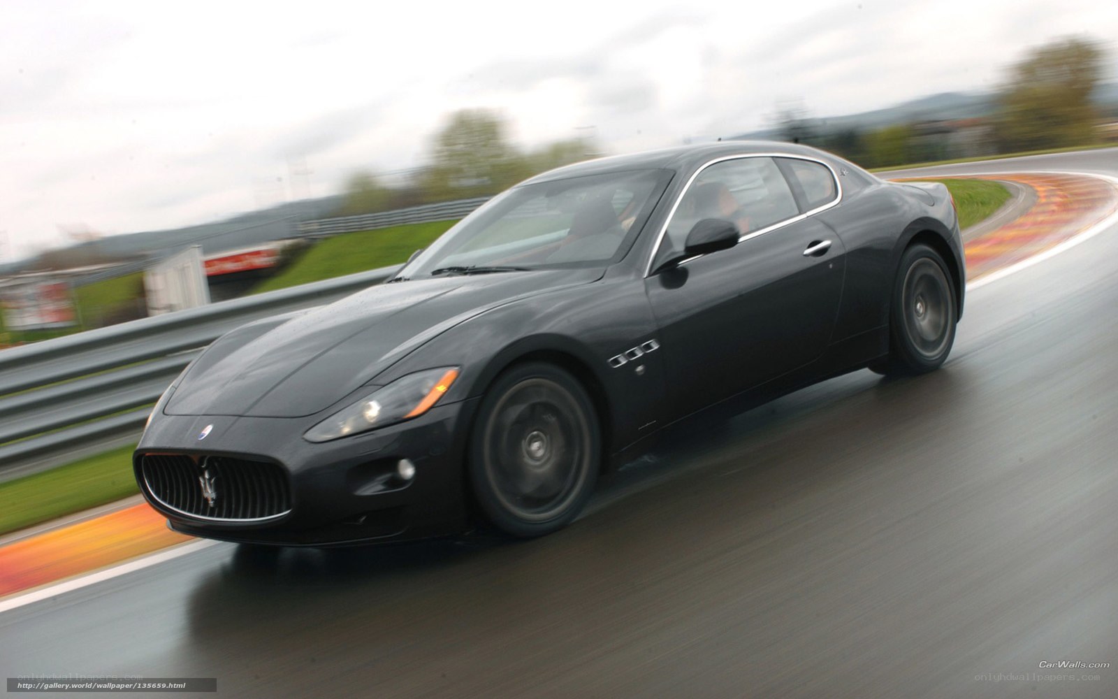 Maserati driving on a racetrack