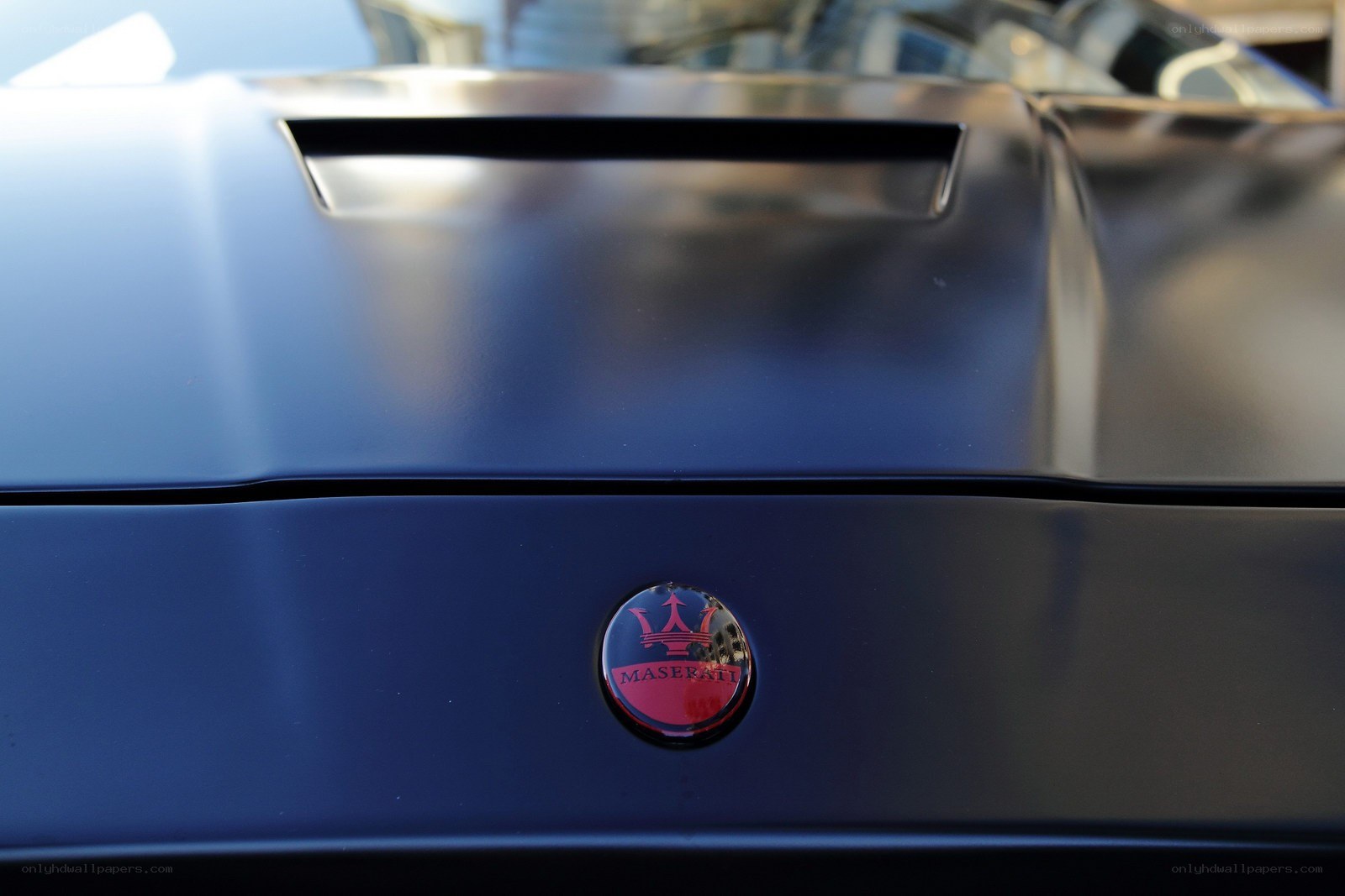 Maserati emblem on car hood