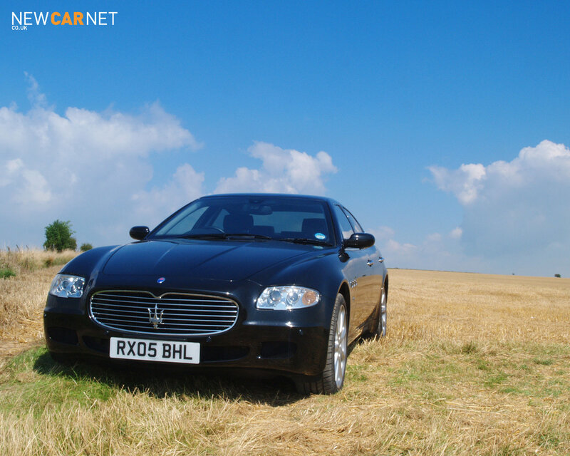 Maserati in a field