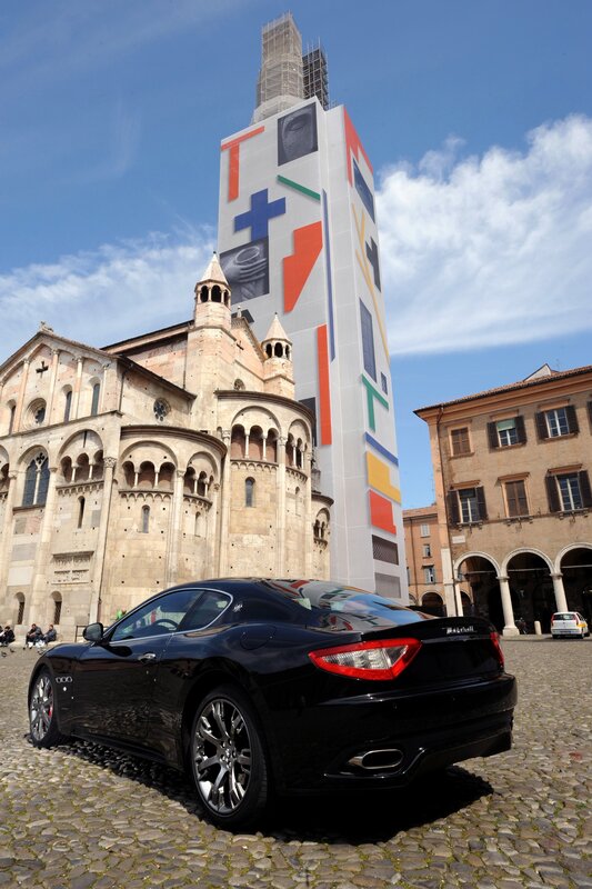 Maserati in front of cathedral