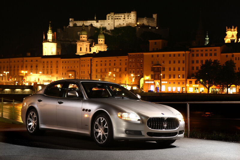 Maserati on a city street at night