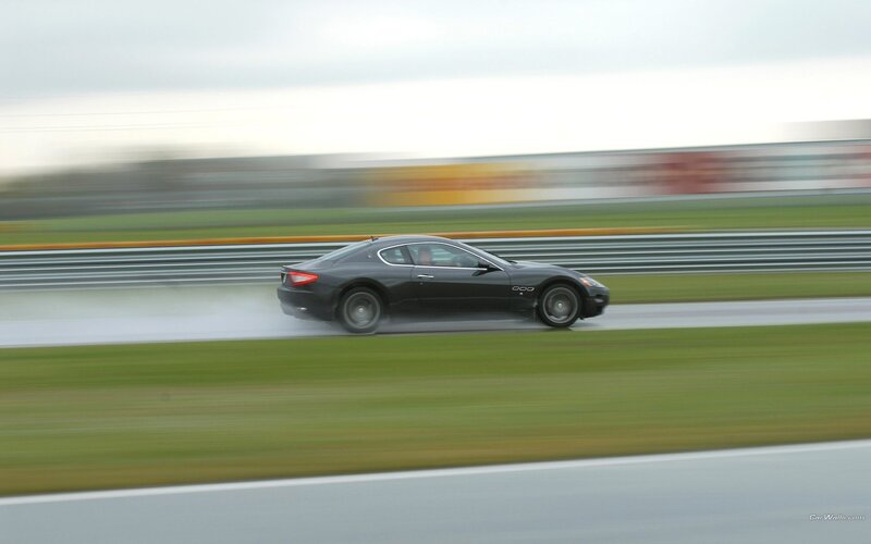 Maserati on a wet racetrack