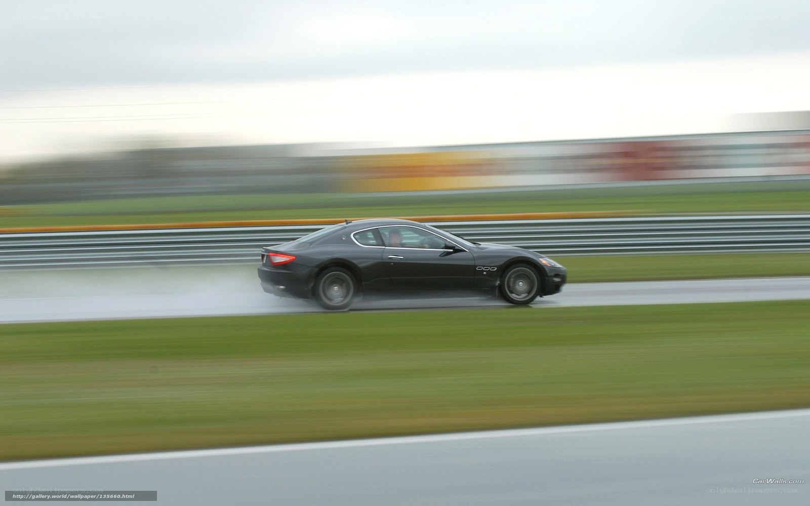 Maserati on wet racetrack
