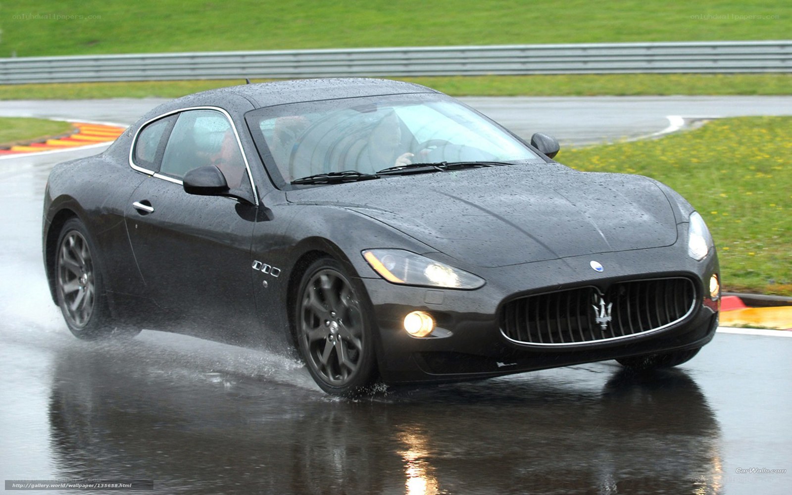 Maserati on wet racetrack