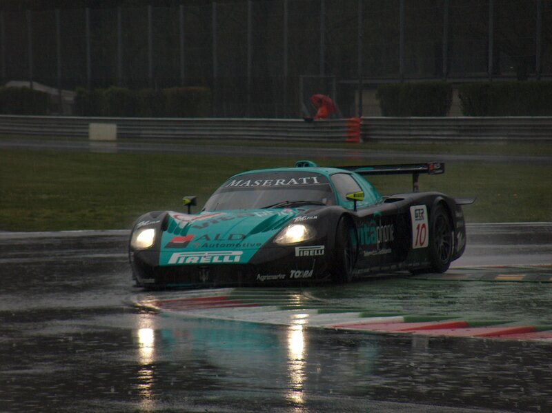 Maserati race car on wet track