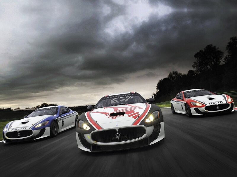 Maserati race cars on track