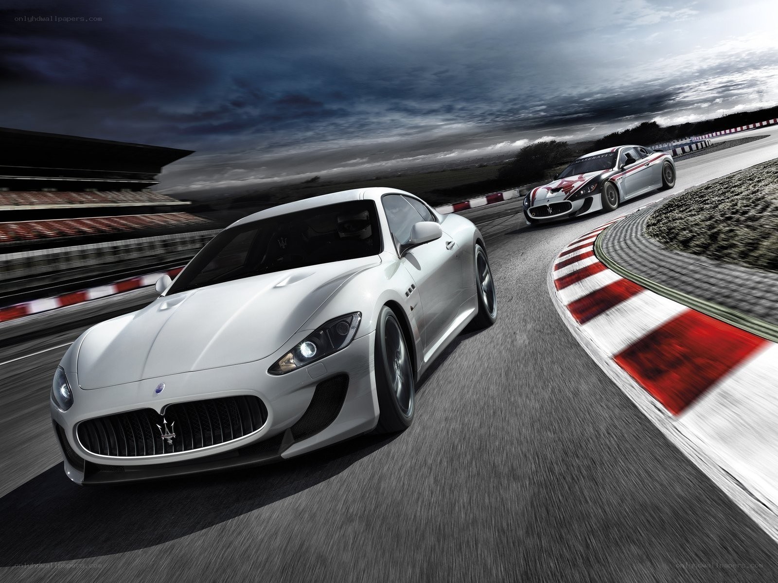 Maserati racing on a track
