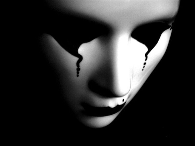 mask with black tears