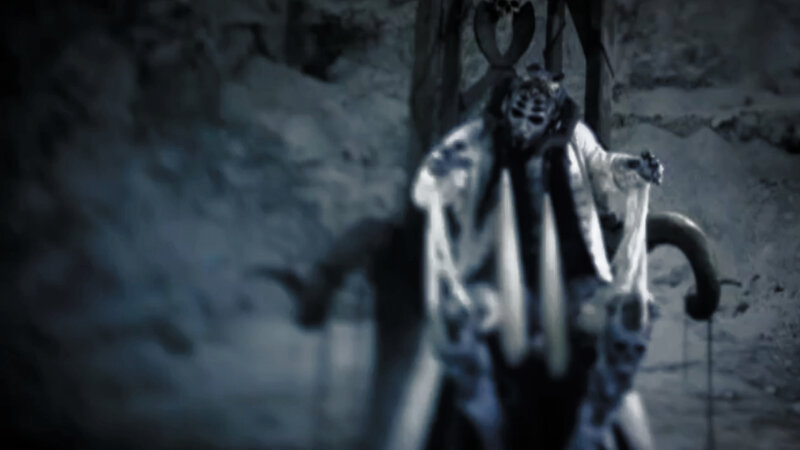 masked figure in dark setting