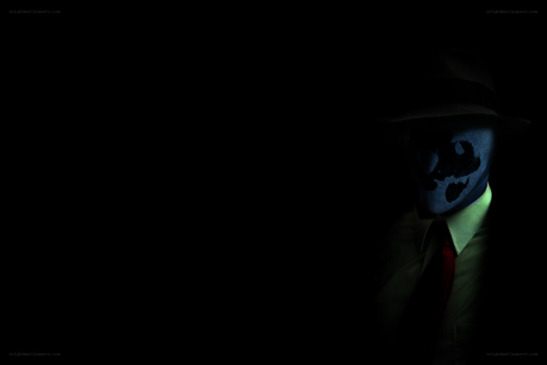 masked figure in dark suit