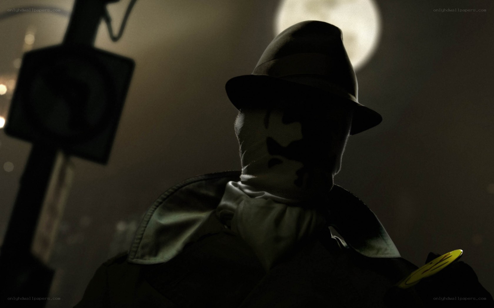 masked figure in moonlight