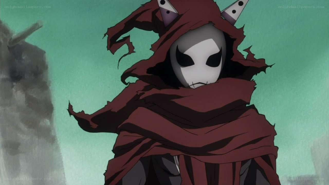 masked figure in red cloak